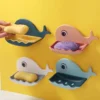 fish-shaped soap holders mounted on the wall