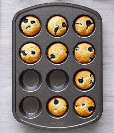 Muffin tray filled with cupcakes