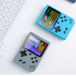grey and blue handheld retro game consoles